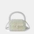 Bolso de perlas hecho a mano con asa superior y correa de hombro en blanco crema - Blanco