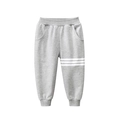 Classic grey cotton jogger pants for boys featuring white stripe details and ribbed cuffs - 90cm / Heather Grey