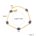 Gold stainless steel bamboo bar bracelet with five square blue crystals and lobster clasp - Gold Bar with Blue Square Zirconia (BR28920KG)