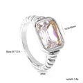 Detailed view of emerald-cut zircon ring with spiral textured band and 13.3x10mm stone - US 6 / Silver Clear Zirconia (RI1461A6-9S)