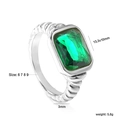 Macro view of emerald-cut green stone ring with cable textured 13.3x10mm band details - Silver Green Zirconia (RI1461J6-9S)