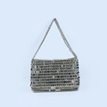 Detail of silver metallic sequin shoulder bag featuring handmade woven disco design - Silver