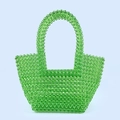 Detail of hand-woven bright green acrylic beaded tote bag with rounded top handles - Green