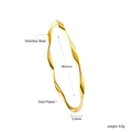 Detail view of gold-plated stainless steel twisted bangle with size 66.5mm specifications - Gold Twisted Minimalist Style (BR922401G)