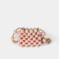 Pink handmade beaded mini bag with textured berry design and gold metal strap links - Pink