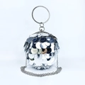 Detail of silver spherical evening bag with large sequins and rhinestone ring handle - Silver
