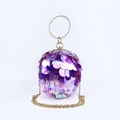 Detailed macro of a purple sequined sphere evening bag with a gold rhinestone handle - Phantom Purple