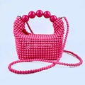 Detail of rose red handmade beaded handbag with large bead handle and long strap - Rose Red