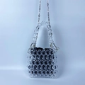 Detail of beaded mini bag with transparent beads, black lining and metal chain strap - Clear