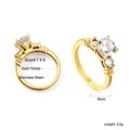 Macro view of gold plated stainless steel three-stone ring with 8mm zircon detail - US 6 / Three Stone Set (RI139806-9G)