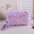 Detail of soft purple leopard plush makeup bag with pink woven label and knit handle - Purple Leopard