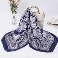 Classic navy paisley satin scarf draped over a white handbag in a luxury setting - 90*90cm / Navy Paisley