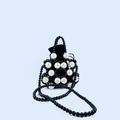 Handmade beaded mini bag featuring black and white pearls with black drawstring insert - Pearl and Black
