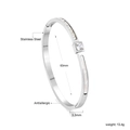 Silver stainless steel geometric bangle with zircon inlay and 63mm inner diameter - Silver Mother of Pearl Zirconia Style (BR925102S)