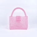 Detailed close-up of pink and clear acrylic beads on a handmade woven mini bag - Pink