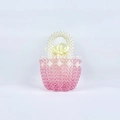 Detail of pink beaded handbag with pearl handle and satin interior with silk bow - Pink