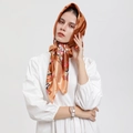 Silk-satin square scarf with geometric print styled as an elegant headscarf for women - CC-Khaki