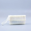 Handmade woven crystal clear acrylic and white bead clutch bag with a wrist strap - White