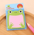 Notes adhésives mignonnes en forme de grenouille verte sur un plateau en bois - Note Autocollante Grenouille