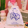 Cute cream canvas drawstring bag featuring a blue puppy illustration and motivational text - Cartoon Dog