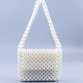Detail of hand-woven square white pearl handbag with beaded shoulder strap - White