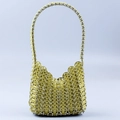 Detailed view of the lemon yellow metal chainmail texture and handcrafted woven link pattern - Yellow