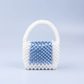 Handmade woven beaded handbag in blue and white acrylic pearls with a square design - Blue + White
