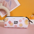 Detail of white pencil case with bold black zipper and orange citrus summer print - Orange