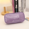Macro shot of purple canvas pencil case with a clear PVC window and zipper closure - Lavender