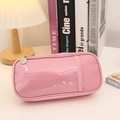 Dettaglio dell'astuccio rosa in tela con finestra in PVC trasparente e cerniera - Rosa