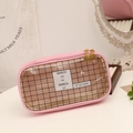 Detail view of pink large capacity pencil case with mesh window and gold zipper pulls - Pink