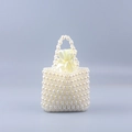Borsa a mano in perle fatta a mano con fodera in raso giallo e coulisse - Bianco latte