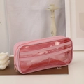 Detail view of pink double-layer transparent pencil case with inner mesh dividers - Sakura Pink