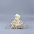 Golden fan-shaped pearl evening bag with champagne satin pouch on blue background - White & Gold