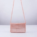 Detailed view of pink handmade beaded crossbody bag with hollow grid pattern - Light Pink