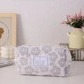 Detailed shot of floral quilted pencil case with top zipper and Sweet Girl label - Flower Purple