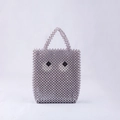 Borsa a mano artigianale di perline con motivo a occhio in grigio perla e bianco chic - Bianco