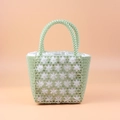 Handmade beaded green pearl handbag with floral accents and cream satin lining - Clear