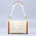 Handmade beaded handbag with white pearls and amber acrylic beads on a blue background - Light Yellow (Pearl White with Amber)