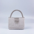 Elegant beaded handbag featuring clear acrylic and silver metal pearls with a curved handle - Light Gray