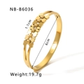 Detail view of 18k gold plated bangle with clover motif and 6cm inner diameter measurement - Hollow Clover Frosted Bead Style (NB-B6036)