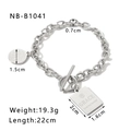 Detail of silver stainless steel T-bar bracelet with heart and tag charms with dimensions - T-Bar Engraved Tag Style (NB-B1041) / Silver