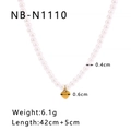 Macro detail of a minimalist pearl necklace featuring a smooth 18k gold-plated heart pendant - Gold Heart Pendant Pearl Necklace (NB-N1110) / 18K Gold