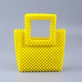 Bright yellow acrylic beaded top handle bag with a handmade woven trapezoid silhouette - Yellow