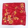 Detail of red satin square scarf with yellow floral pattern and smooth glossy texture - Bright Red with Yellow Flower