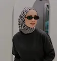 Detail of a 90cm satin scarf with black and white geometric pattern worn as a hijab - 21# Large Houndstooth