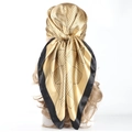 90cm silk satin scarf in champagne gold with black geometric patterns on a mannequin - Diamond Yellow