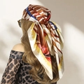 90cm silk square scarf with tropical leaf print in brown and orange worn as headscarf - Rainforest-Yellow