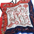 Classic chain print satin silk scarf featuring horsebit and tassel motifs in red and navy - 90x90cm / Red & Blue