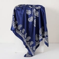 Detailed close-up of navy blue paisley print satin scarf with smooth silk texture - 90cm / Navy Blue